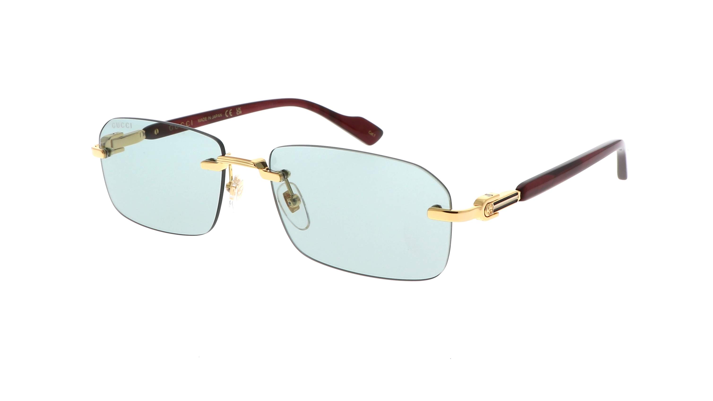 Gucci GG1221S 003 with light blue lenses, minimalist chic
